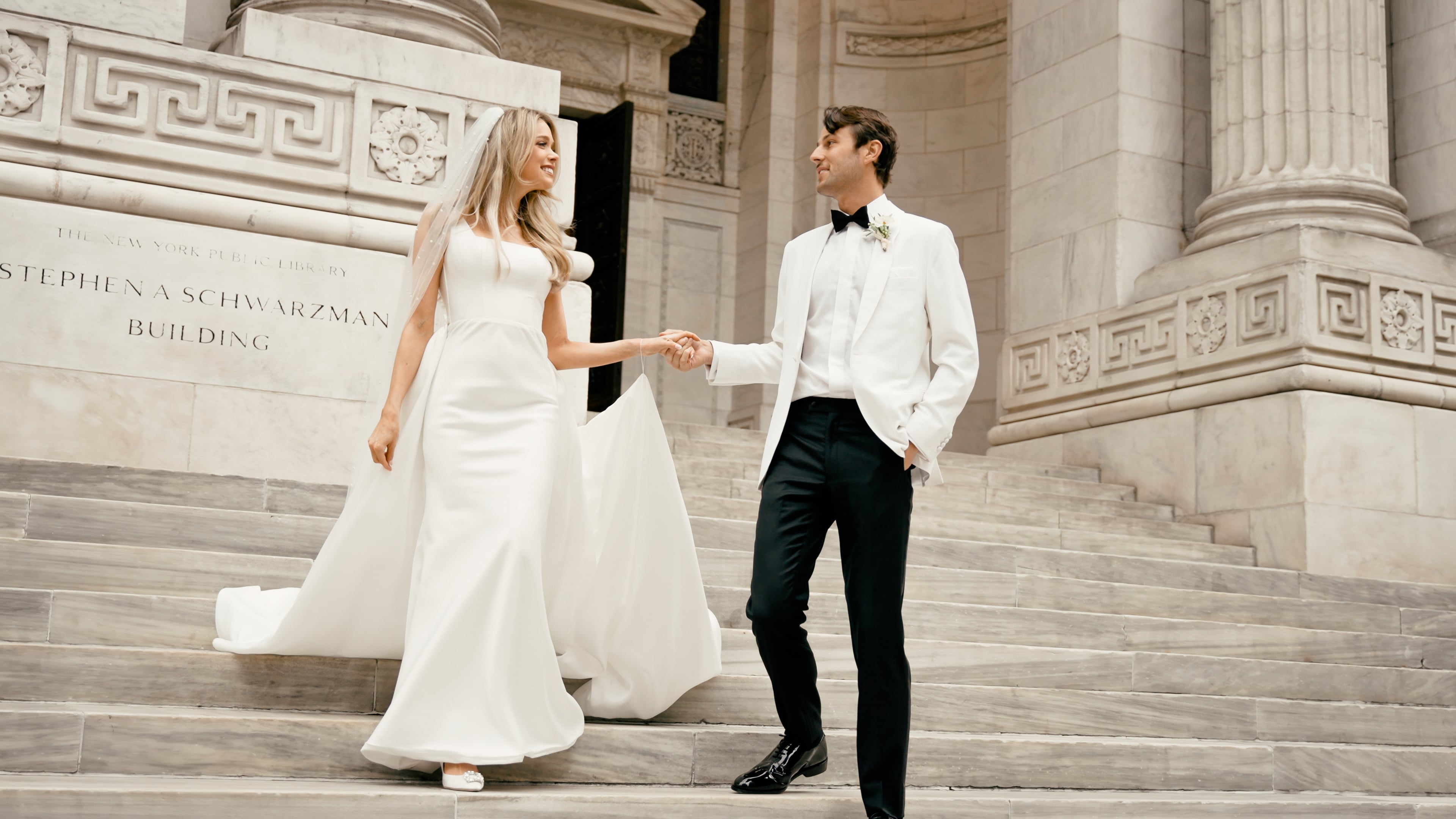 Bride and groom outside the New York Public Library