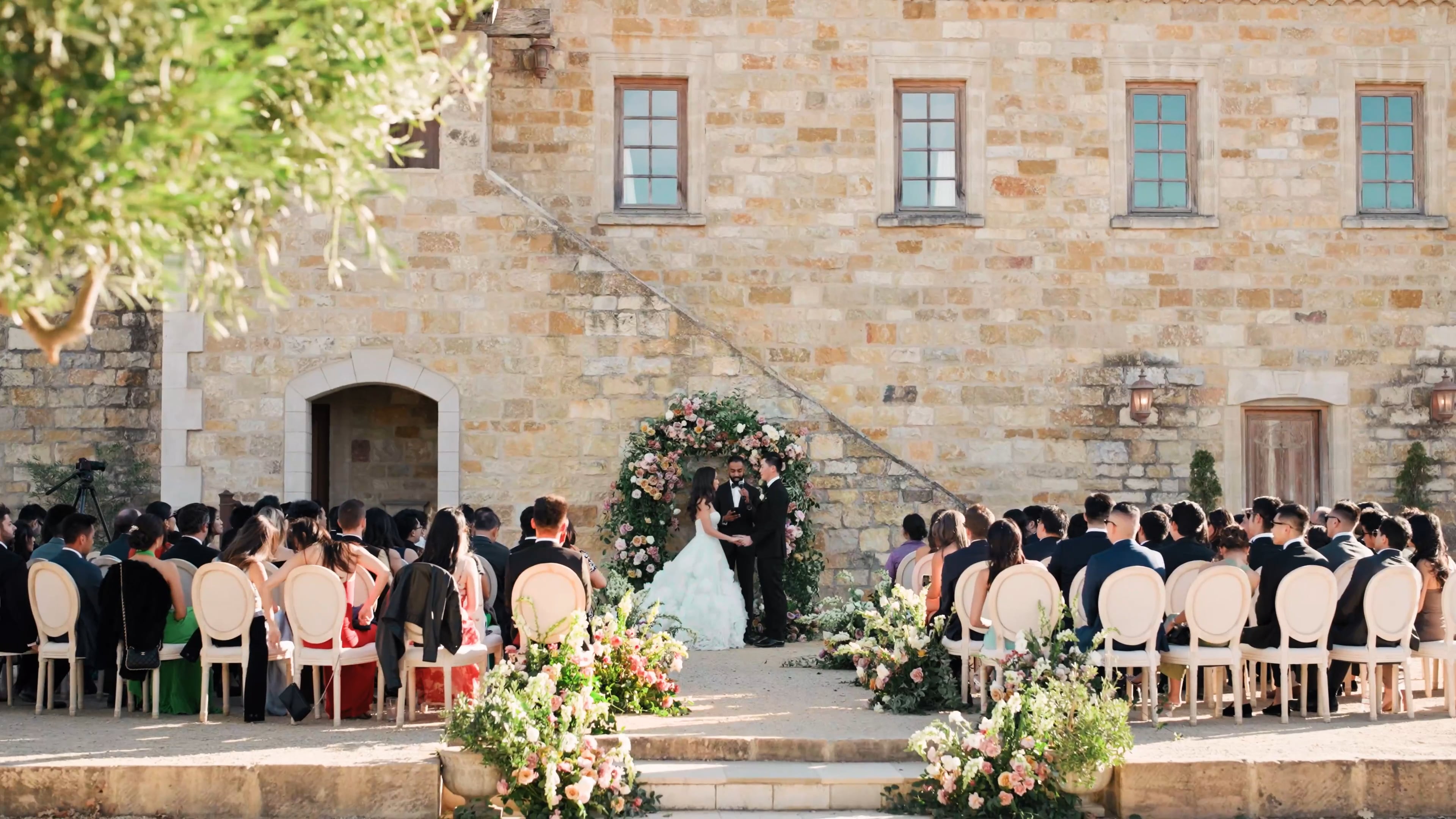 Outdoor wedding ceremony at Sunstone Villa