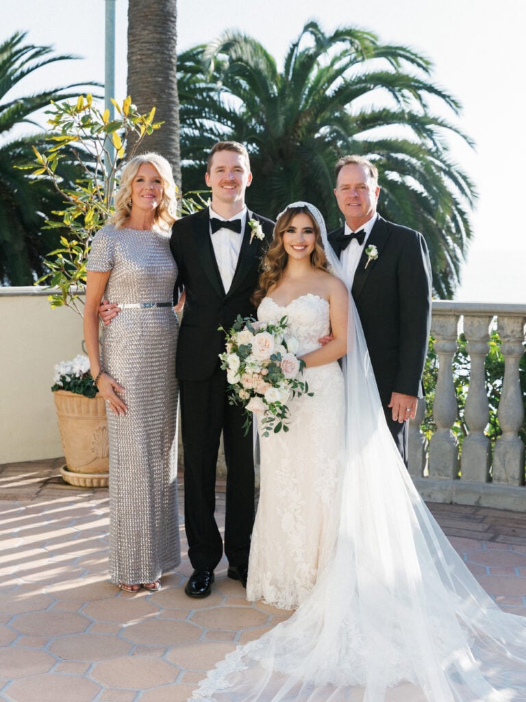 Sophisticated Mother of the Bride dress and elegant family portraits utilizing soft backlighting for premium wedding venue photography.