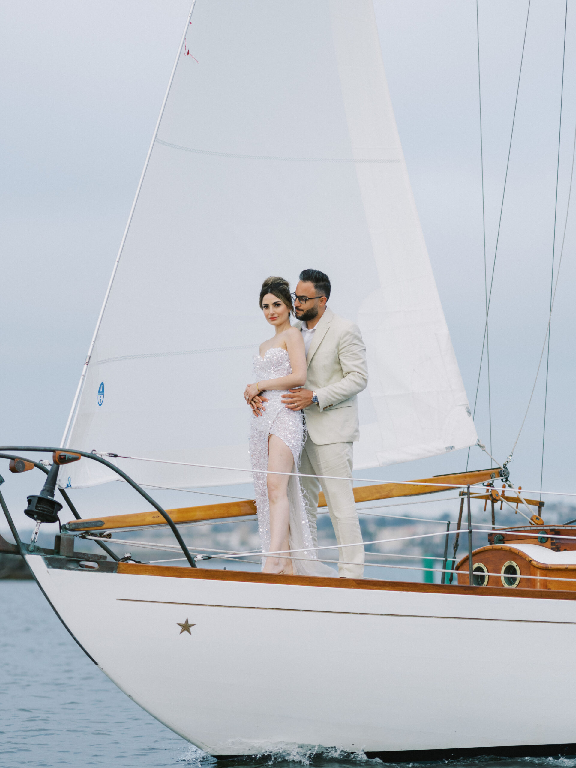 Couple sailing at sunset