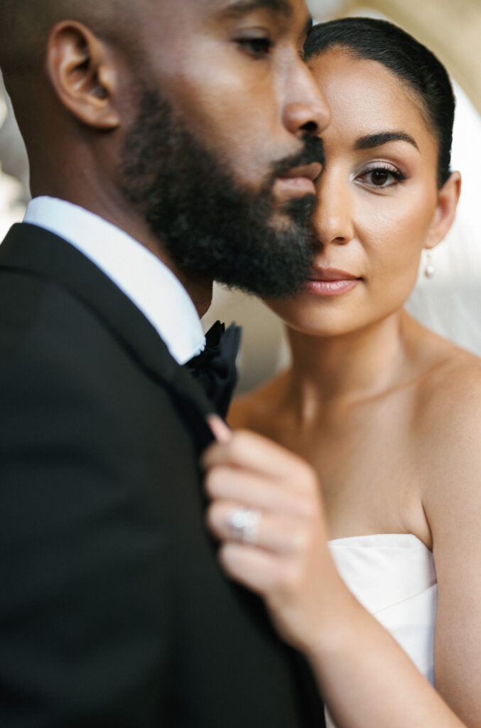 High-fashion wedding portrait inside a luxury venue, inspiring timeless fine-art wedding photo ideas for modern couples.