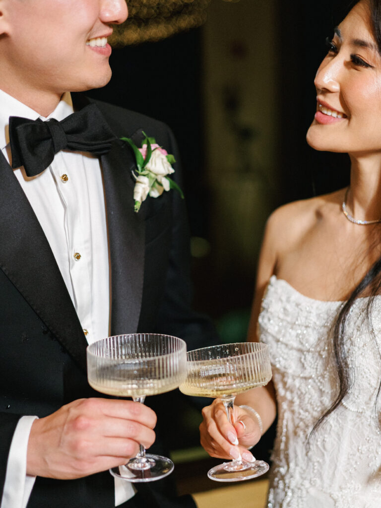 Modern ribbed champagne coupe glasses for wedding reception toasts and elegant bride and groom portrait ideas