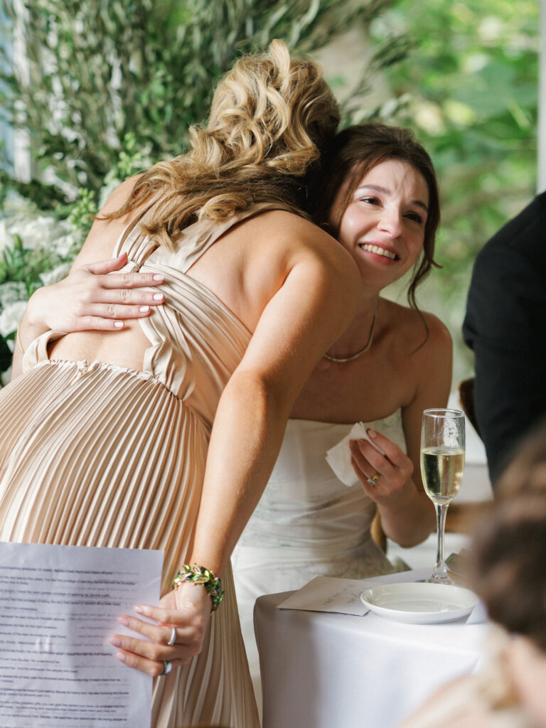 Candid bridesmaid speech reactions and emotional maid of honor hug ideas for brides